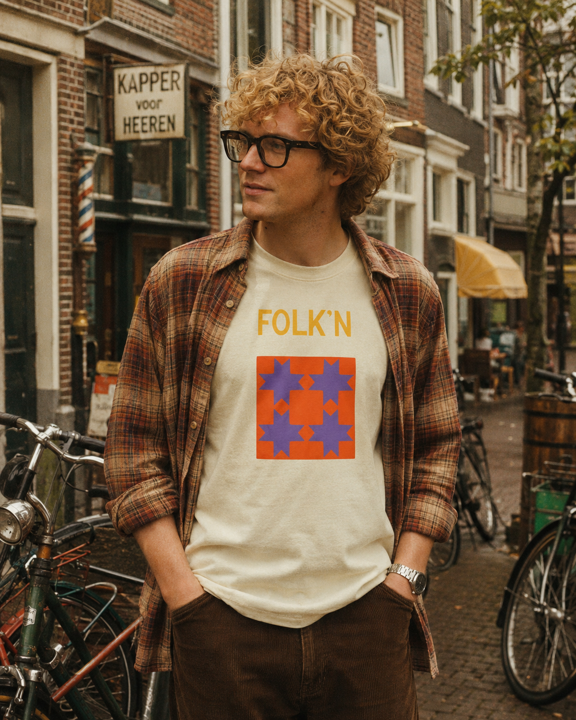 Folk'n quilt-stars tee — orange block with purple eight-point stars, flannel and canal bricks.